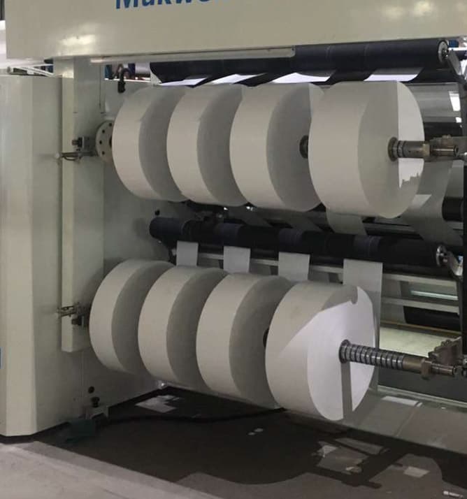 Maszyna do cięcia rolek surowców do etykiet na wymiar — własne cięcie Optimum Solutions